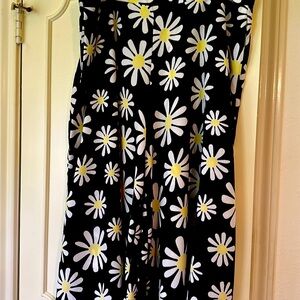 Palazzo pants and matching top,with the matching purse. Size clip pants,top xlp
